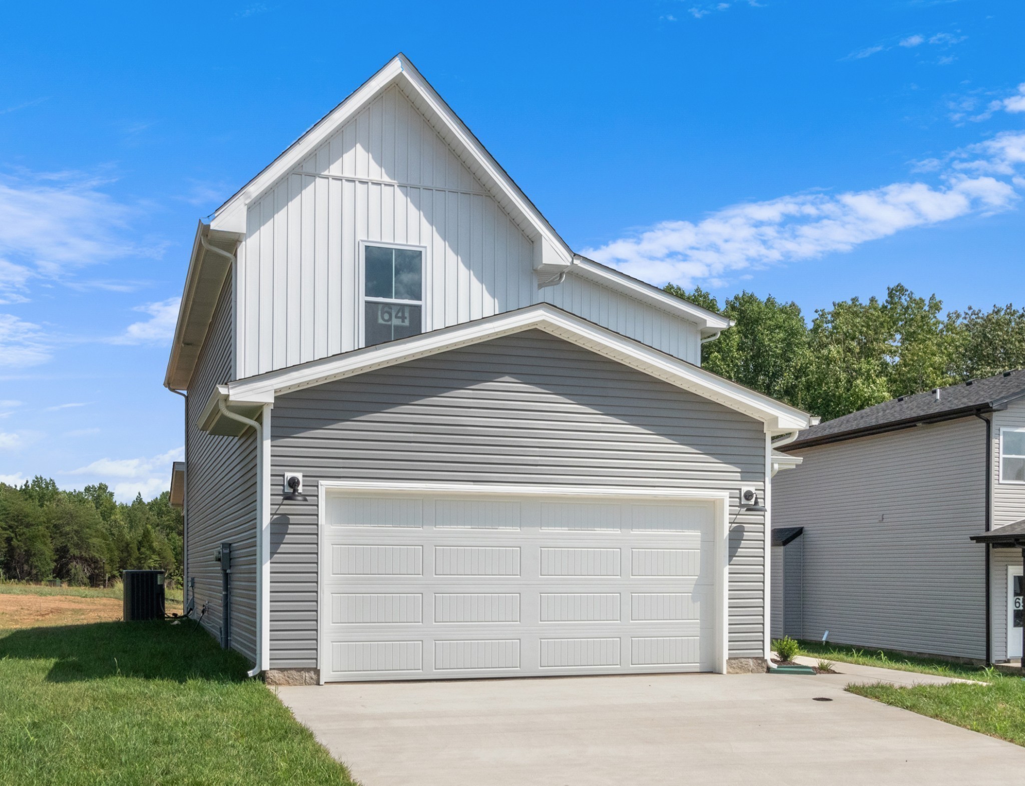 1192 Boulder Pass Road Clarksville, TN 37040 - Photo 4 of 26 a view of a house with a yard and garage