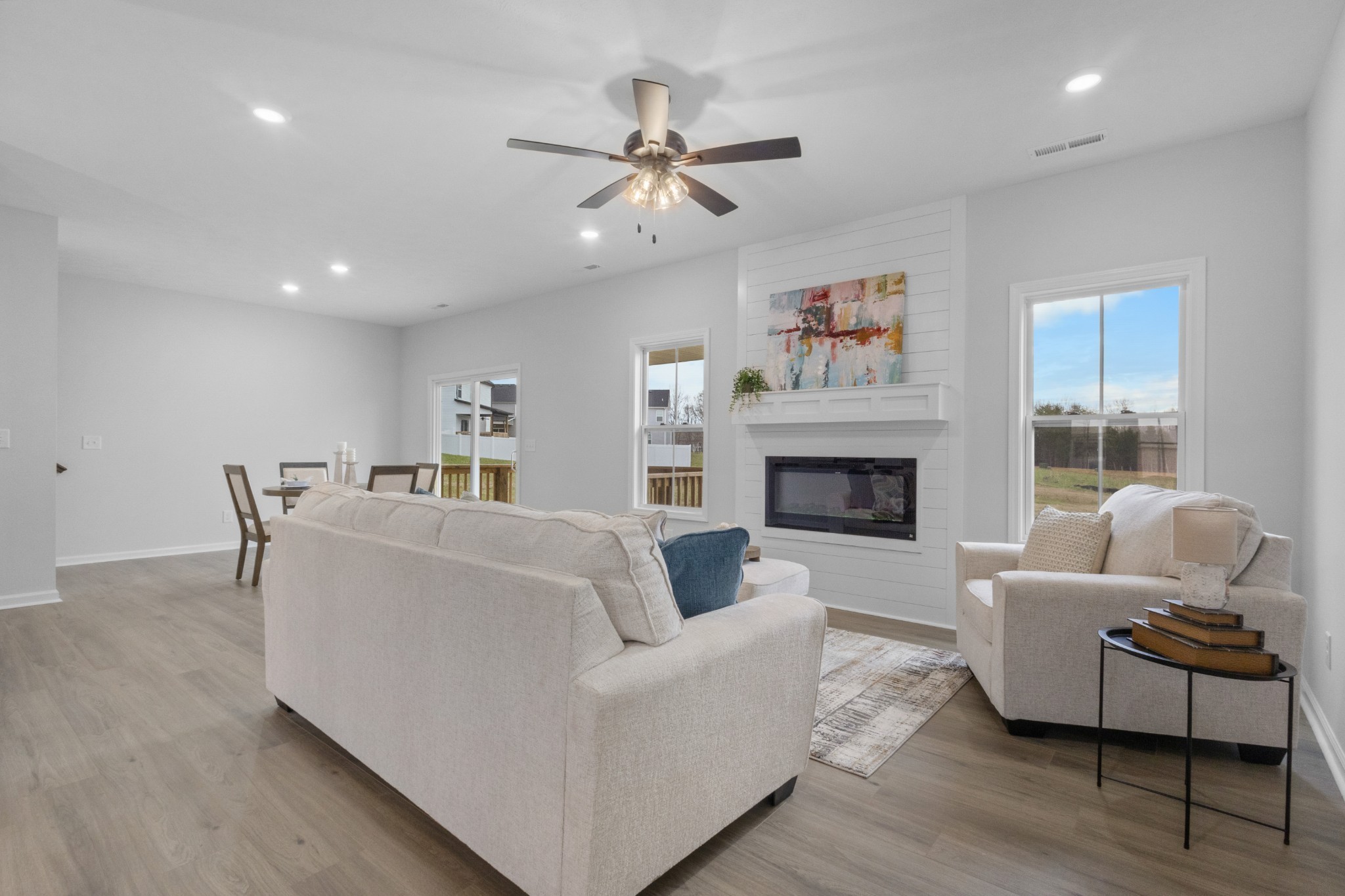 1192 Boulder Pass Road Clarksville, TN 37040 - Photo 8 of 26 a living room with furniture and a fireplace