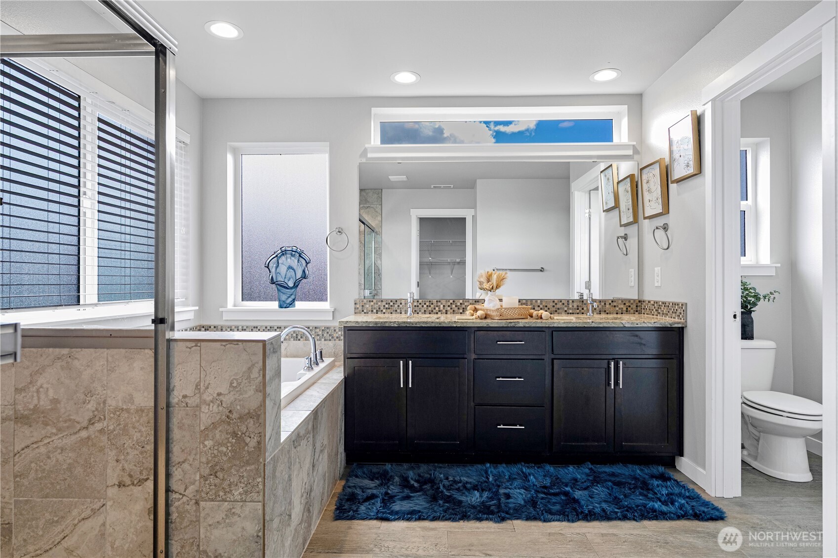 3804 193rd Place Southeast Bothell, WA 98012 - Photo 29 of 40 a bathroom with a granite countertop double vanity sink and a mirror