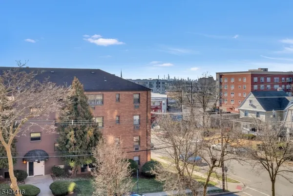 a view of a city with tall buildings