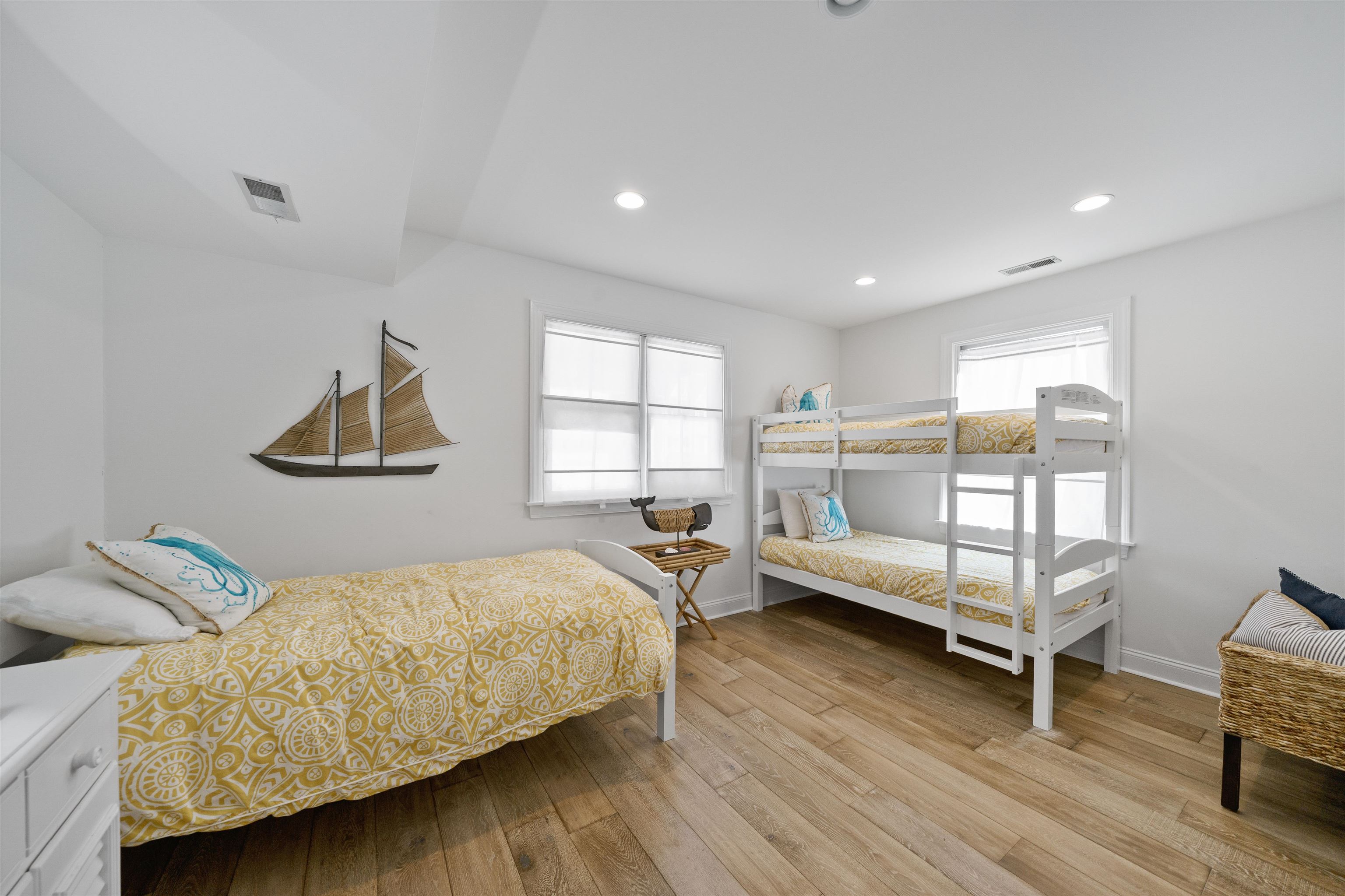 360 39th Street, Unit EAST Avalon, NJ 08202 - Photo 14 of 28 a bedroom with furniture and a wooden floor