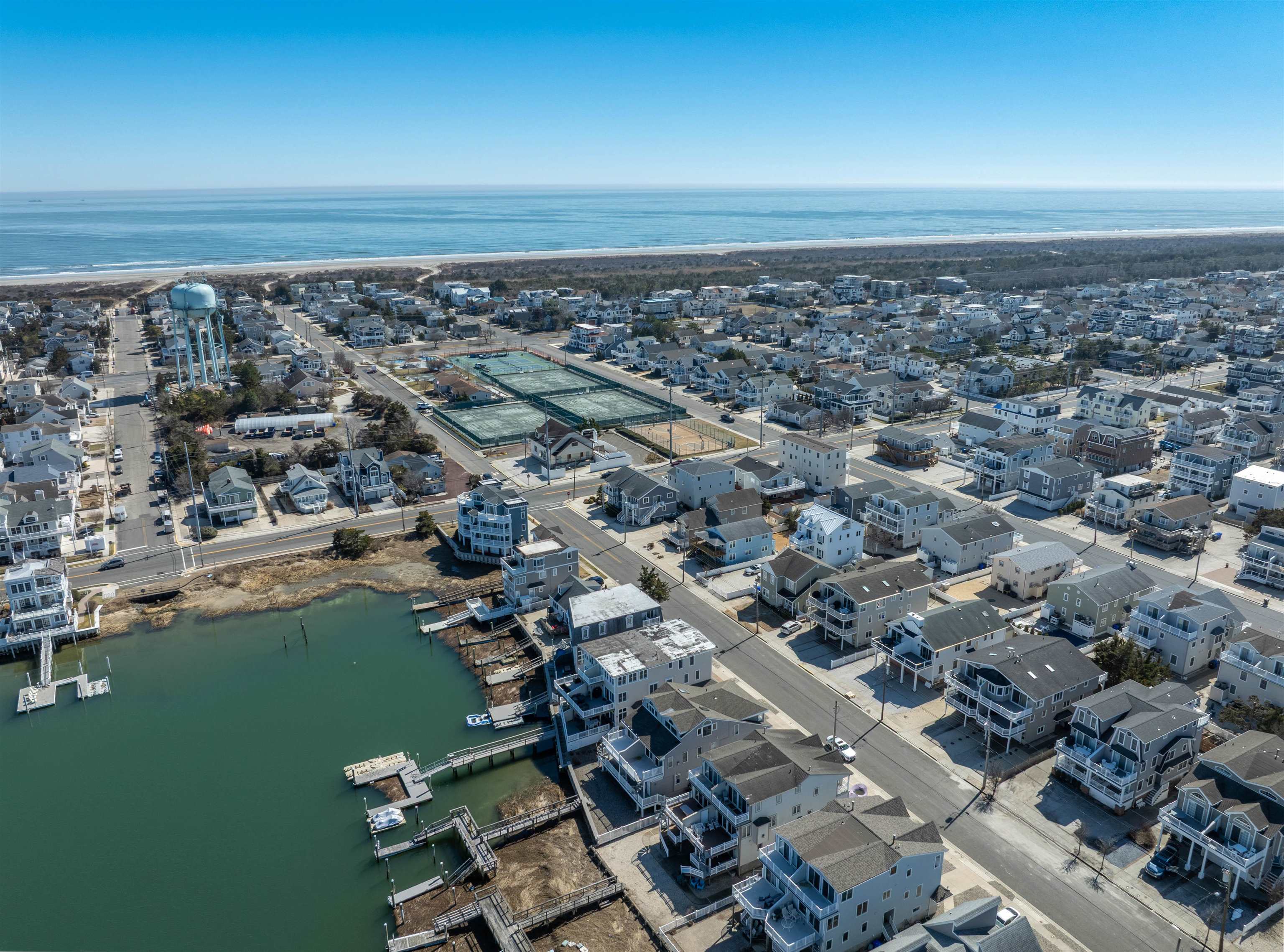 360 39th Street, Unit EAST Avalon, NJ 08202 - Photo 23 of 28 an aerial view of a city with ocean view