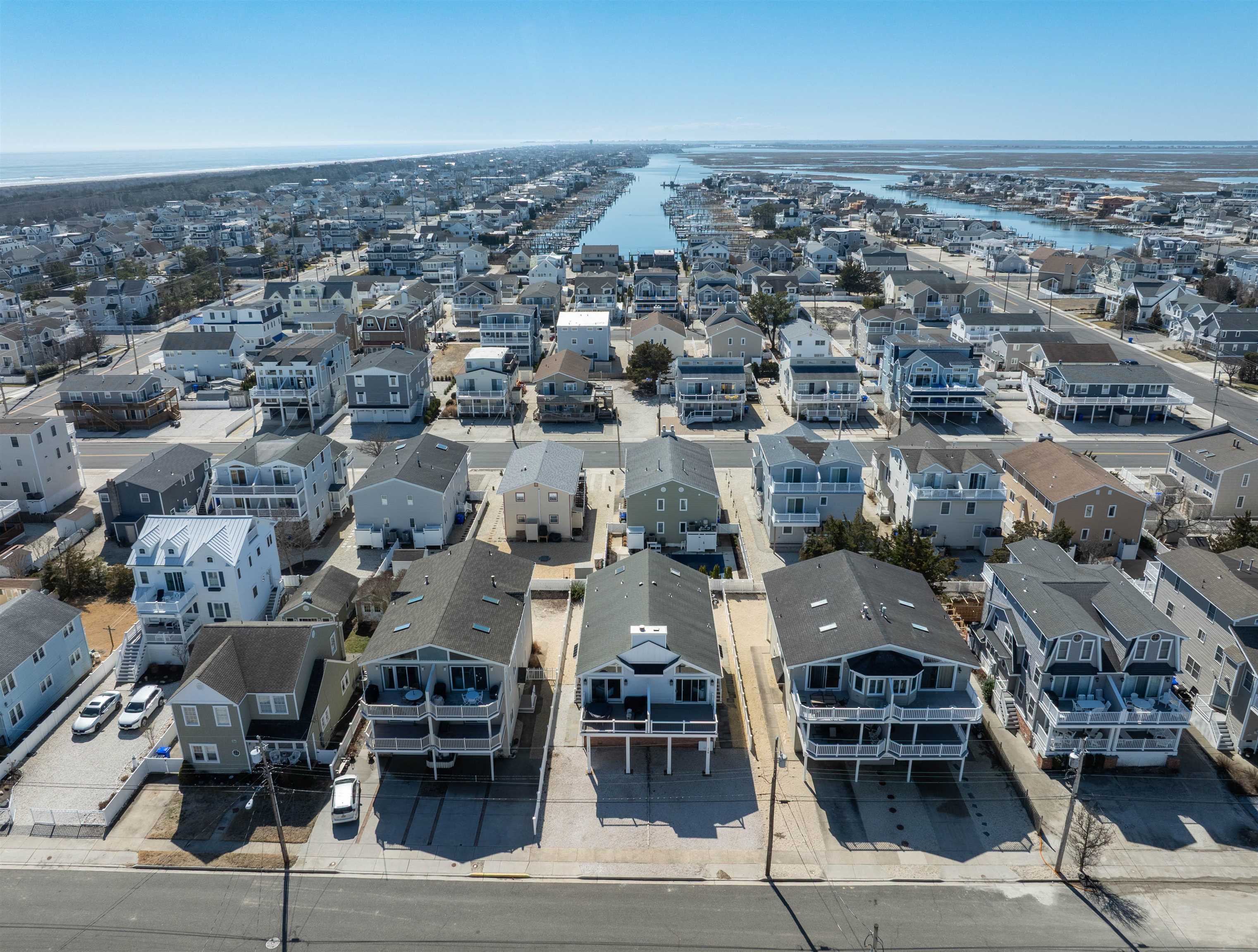360 39th Street, Unit EAST Avalon, NJ 08202 - Photo 25 of 28 an aerial view of a building with parking space