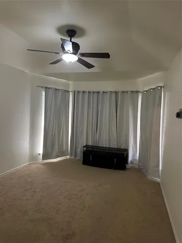 a view of entryway and hall with a window