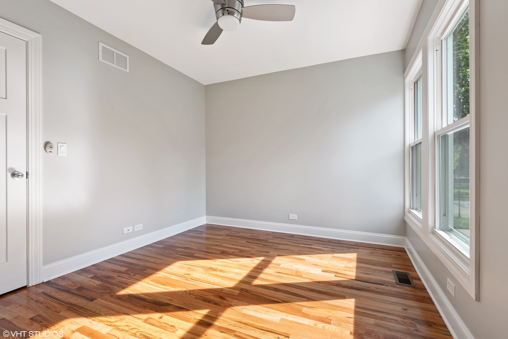 1131 Ridge Road, Unit 1 Wilmette, IL 60091 - Photo 9 of 14 a view of room with window and hardwood floor