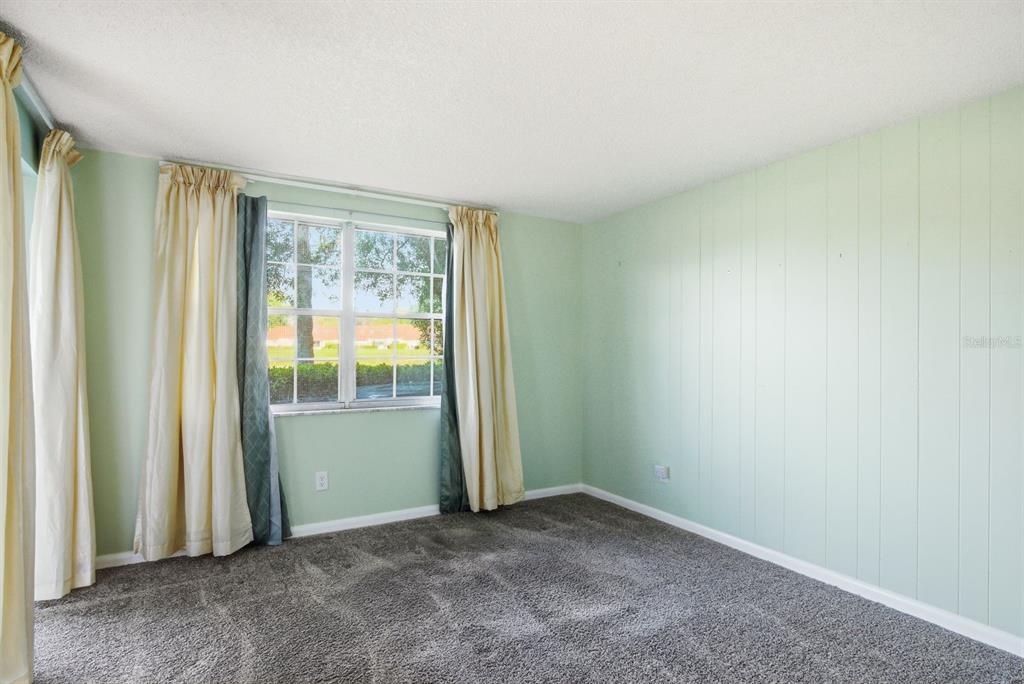 3309 Trophy Boulevard New Port Richey, FL 34655 - Photo 15 of 37 an empty room with windows