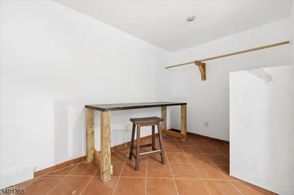 a room with furniture and a window