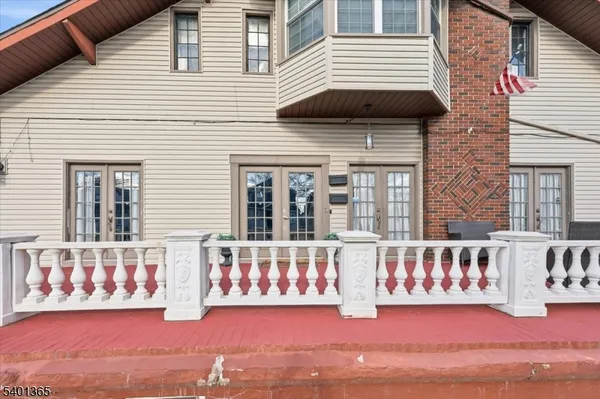 a view of a house with a window and wooden floor