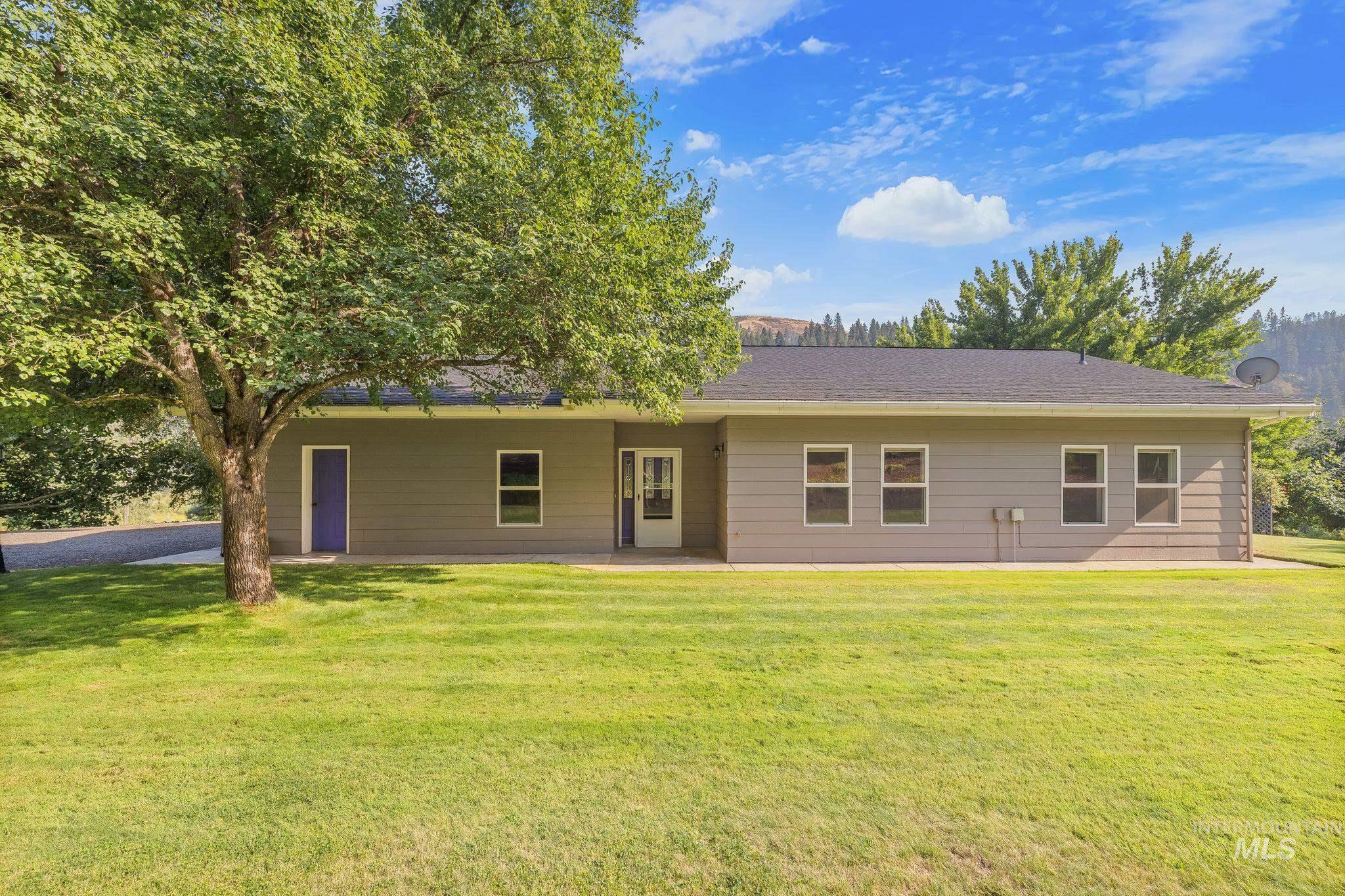1091 Cedar Ridge Road Kendrick, ID 83537 - Photo 5 of 48 Expansive green lawn with mature shade trees