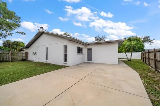 a view of garage and yard