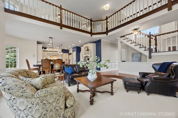 a living room with furniture or stairs and a couch