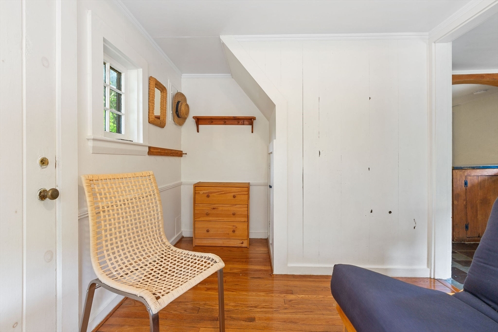 614 Tubman Road Brewster, MA 02631 - Photo 22 of 26 a living room with furniture and a window