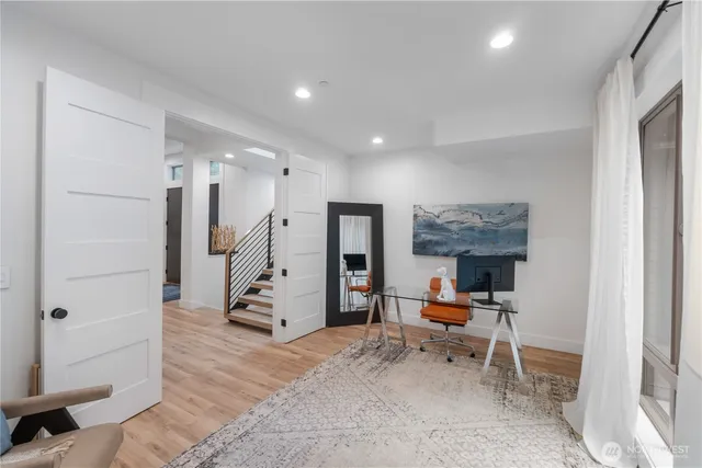 a room with furniture and wooden floor