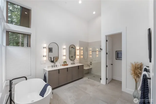 a bathroom with a toilet sink and shower