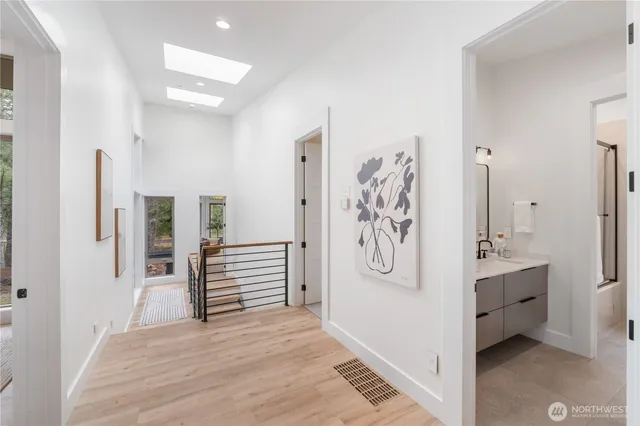 a view of a hallway view with staircase