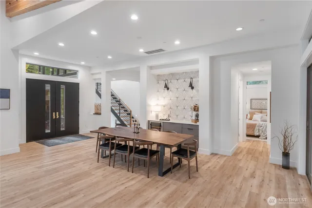 a room with furniture and wooden floor