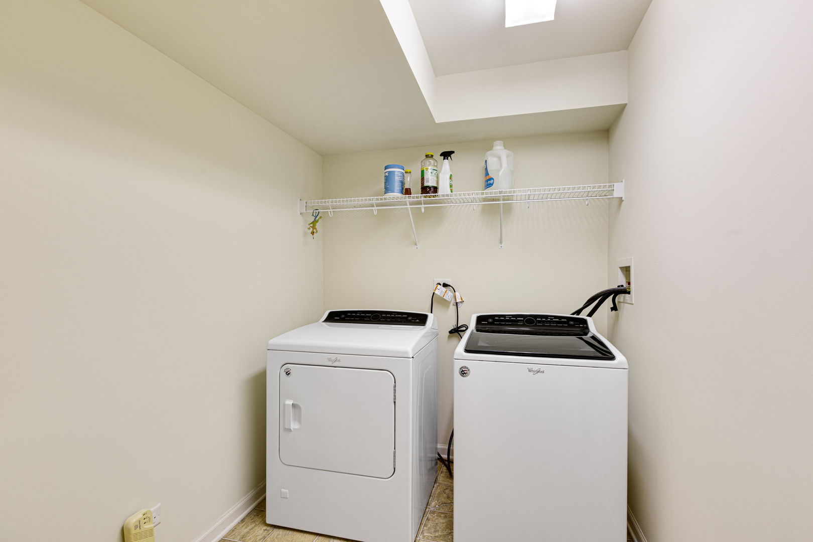 674 Lambert Lane Bartlett, IL 60103 - Photo 18 of 22 a utility room with dryer and washer