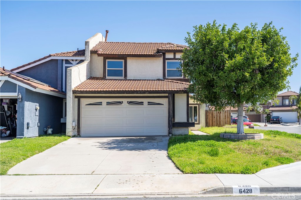 6428 Pine Falls Trail Riverside, CA 92509 - Photo 1 of 1 a front view of a house with a yard