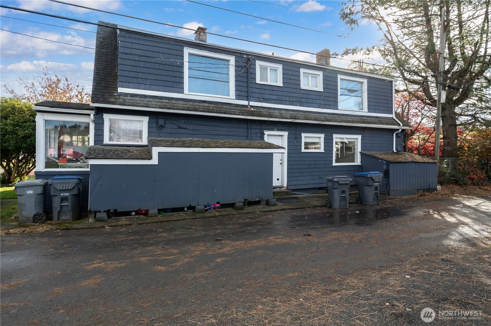 409 North M Street Aberdeen, WA 98520 - Photo 2 of 20 a front view of a house with a yard