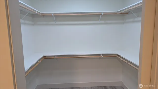 a view of a room with racks on the wall