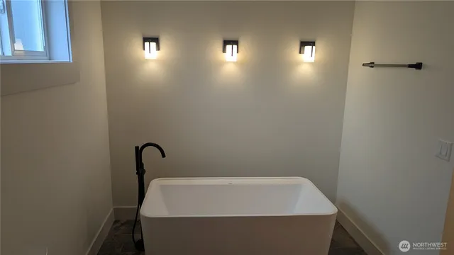 a bathroom with a bathtub