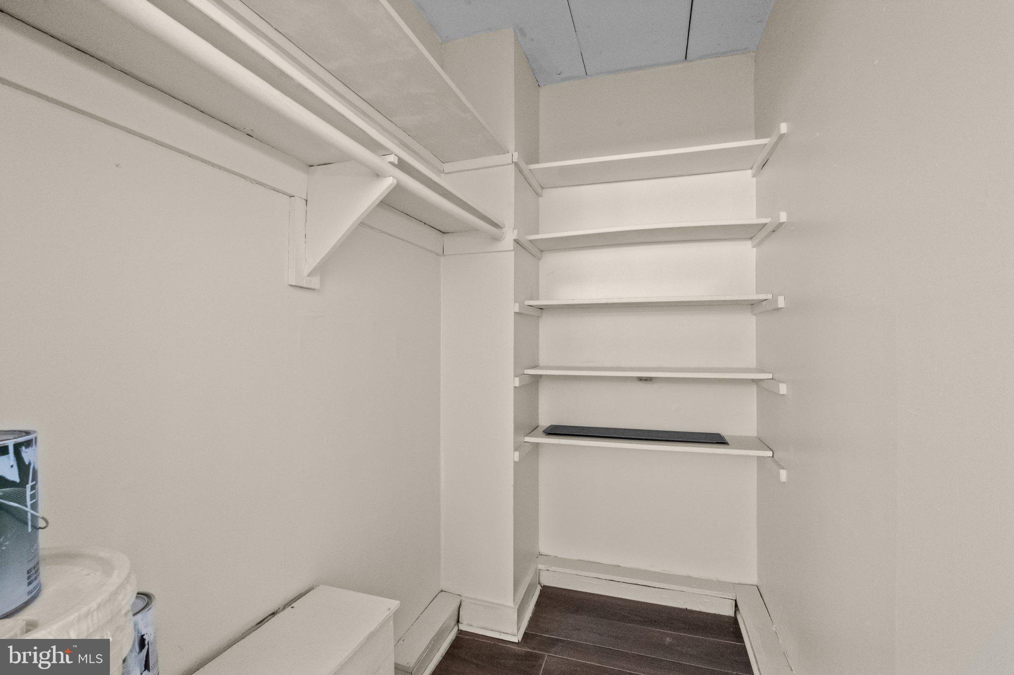 1575 West Street Road, Unit 818 Warminster, PA 18974 - Photo 11 of 24 a view of walk in closet with empty racks