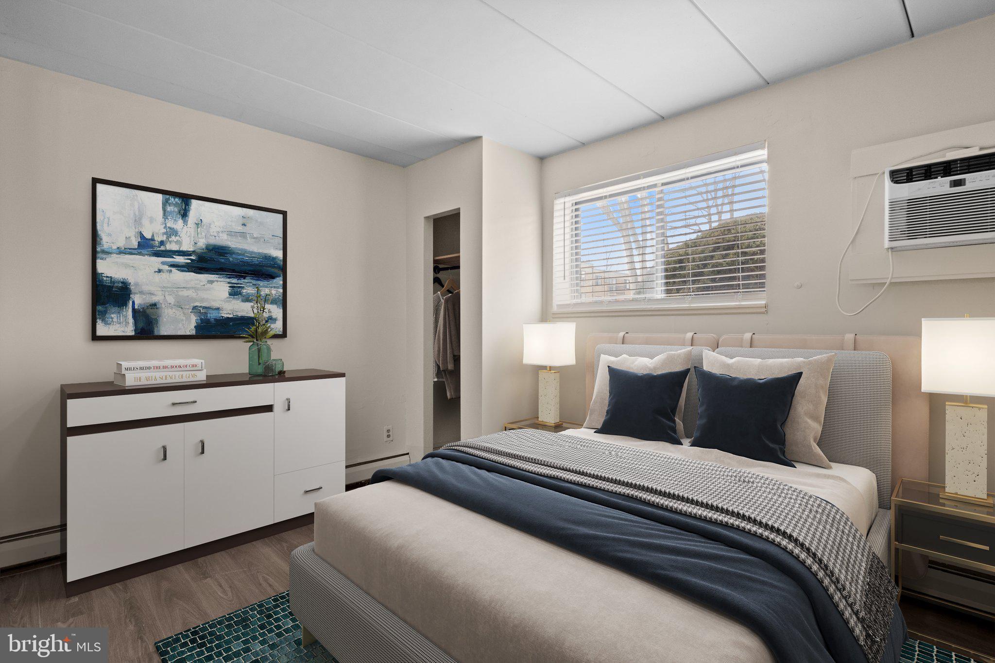 1575 West Street Road, Unit 818 Warminster, PA 18974 - Photo 12 of 24 a bedroom with a bed and a dresser