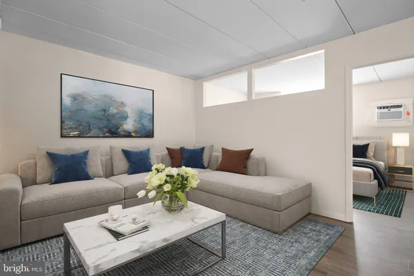 a living room with furniture and a couch
