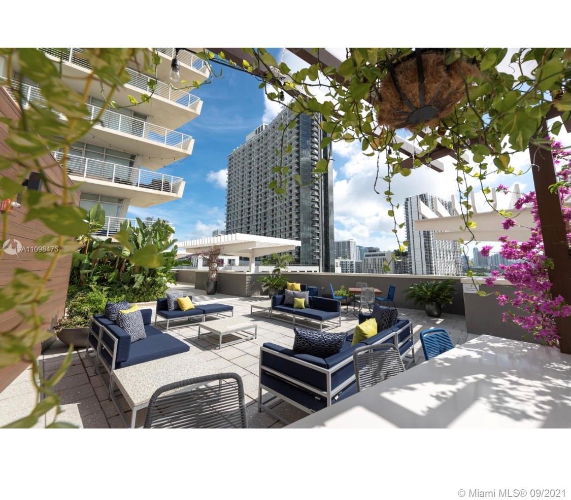 Midtown Miami Miami, FL 33127 - Photo 21 of 26 a outdoor living space with patio furniture