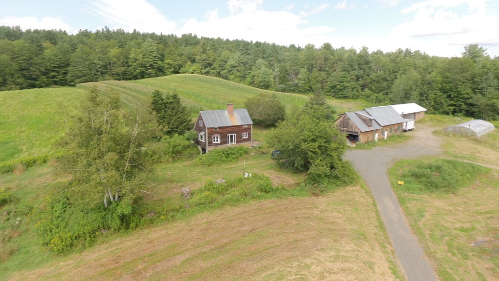 108 West Leyden Road Colrain, MA 01340 - Photo 1 of 30 a view of a swimming pool with a yard