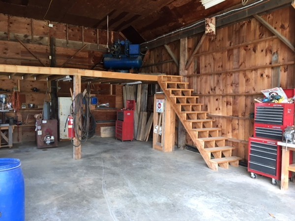 108 West Leyden Road Colrain, MA 01340 - Photo 19 of 30 a view of a garage room with a white car parked