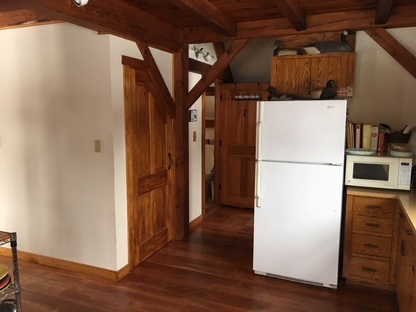 108 West Leyden Road Colrain, MA 01340 - Photo 10 of 30 a view of a storage and utility room with wooden floor