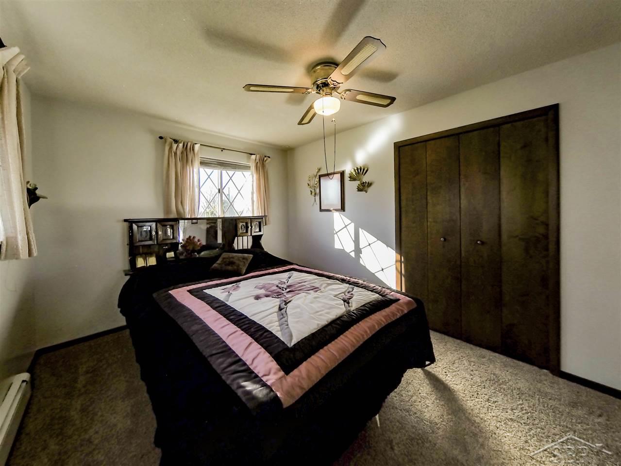 2366 West Wheeler Road Auburn, MI 48611 - Photo 9 of 15 Master Bed and 2nd Bed both have ceiling fans.
