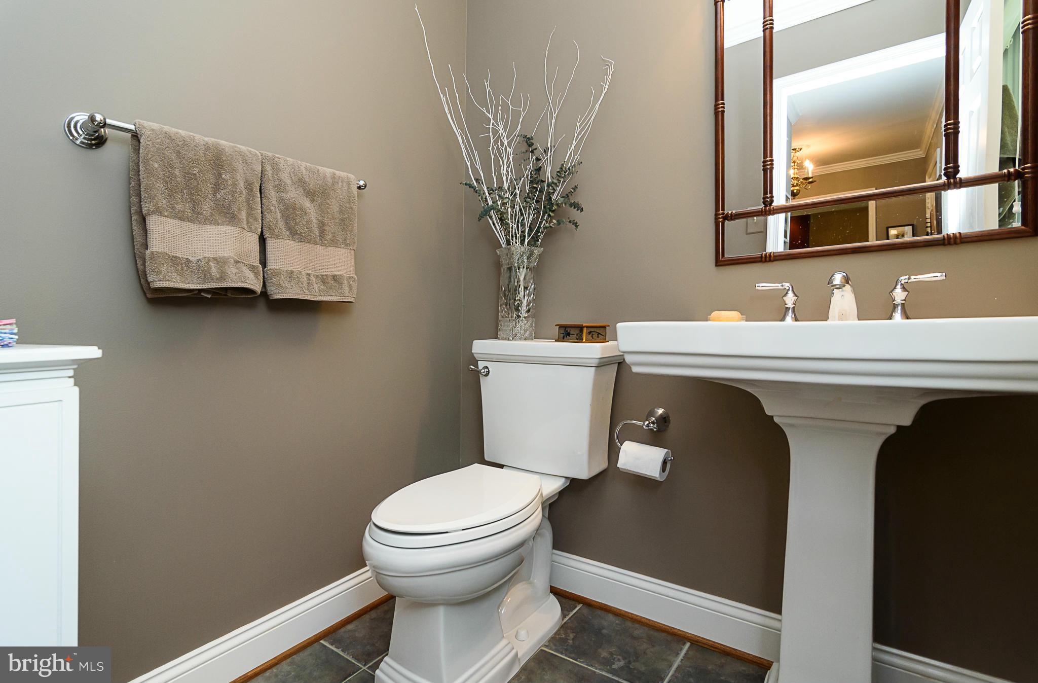 7355 Kindler Road Columbia, MD 21046 - Photo 13 of 30 Remodeled powder room with pedestal sink