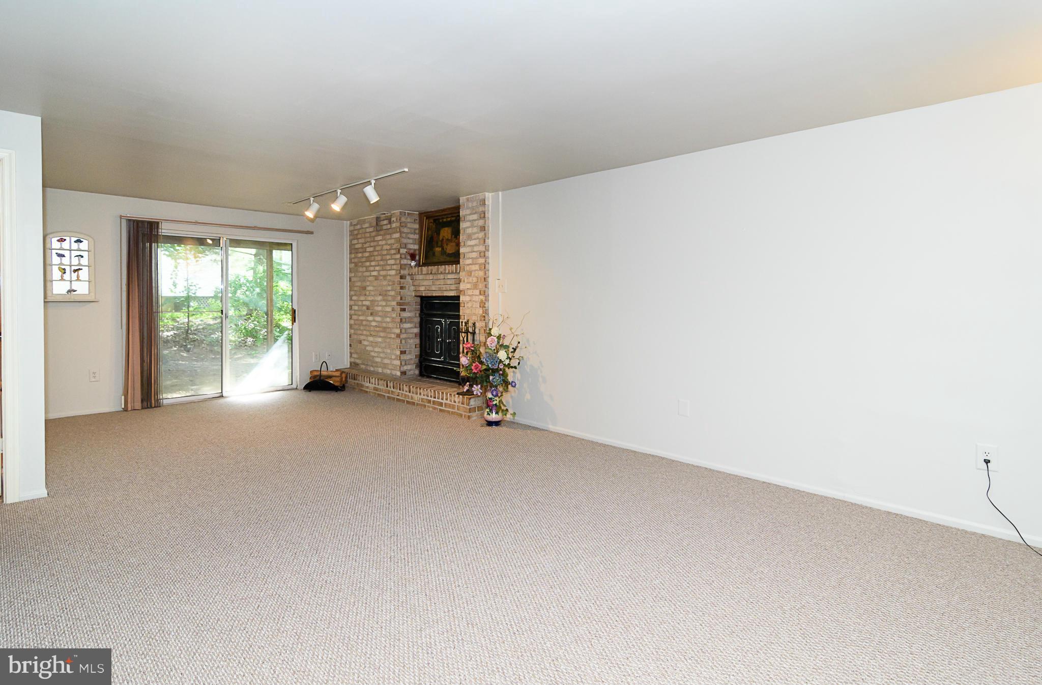 7355 Kindler Road Columbia, MD 21046 - Photo 22 of 30 Finished, walkout lower level with storage room