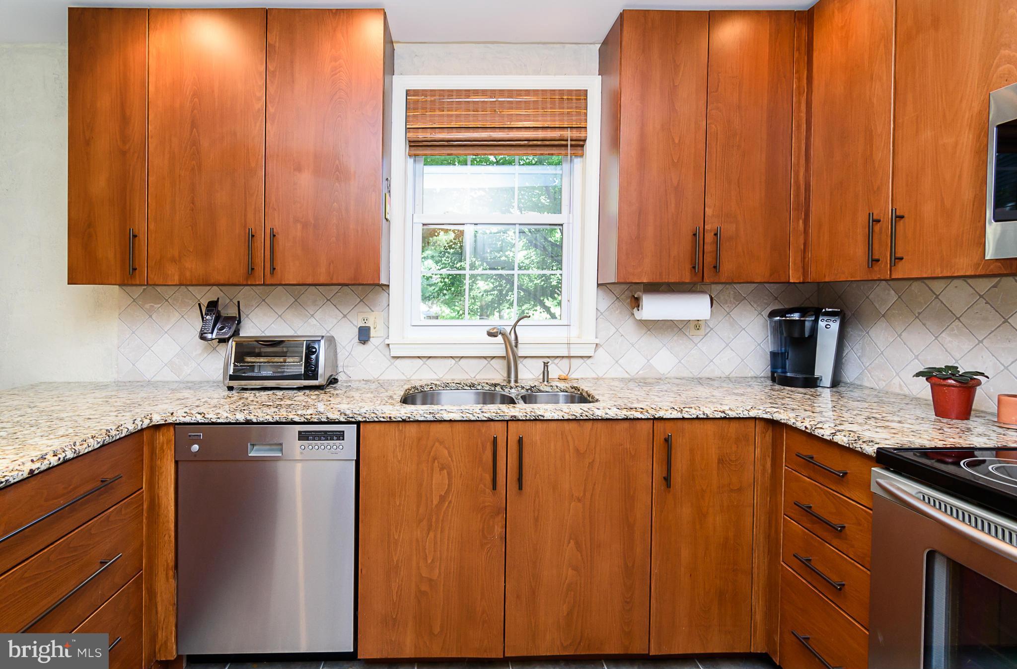 7355 Kindler Road Columbia, MD 21046 - Photo 4 of 30 Granite counters with under-mount double sinks