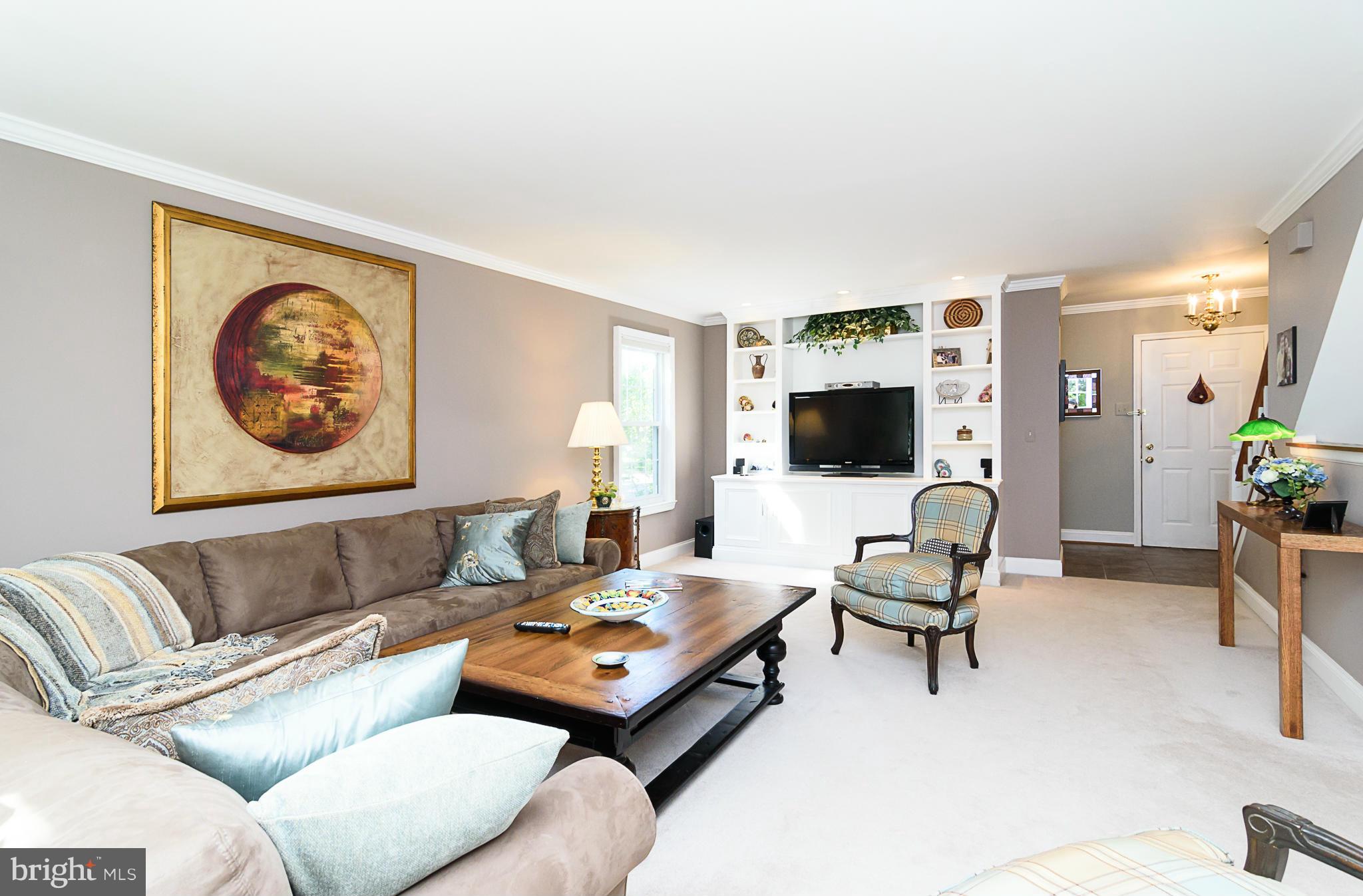 7355 Kindler Road Columbia, MD 21046 - Photo 10 of 30 Crown moldings and built-in entertainment center