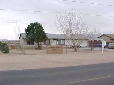 11545 Mohawk Road Apple Valley, CA 92308 - Photo 1 of 1 a view of a house with a outdoor space