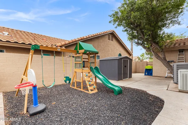 a view of a house with a park