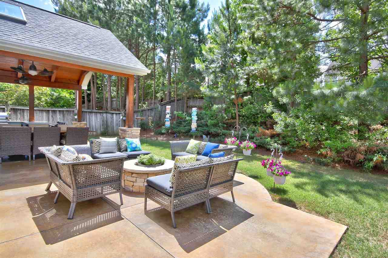 7532 Silver View Lane Raleigh, NC 27613 - Photo 28 of 30 Want to soak in the sun? Gather around the fire pit and catch some rays. Exterior Back