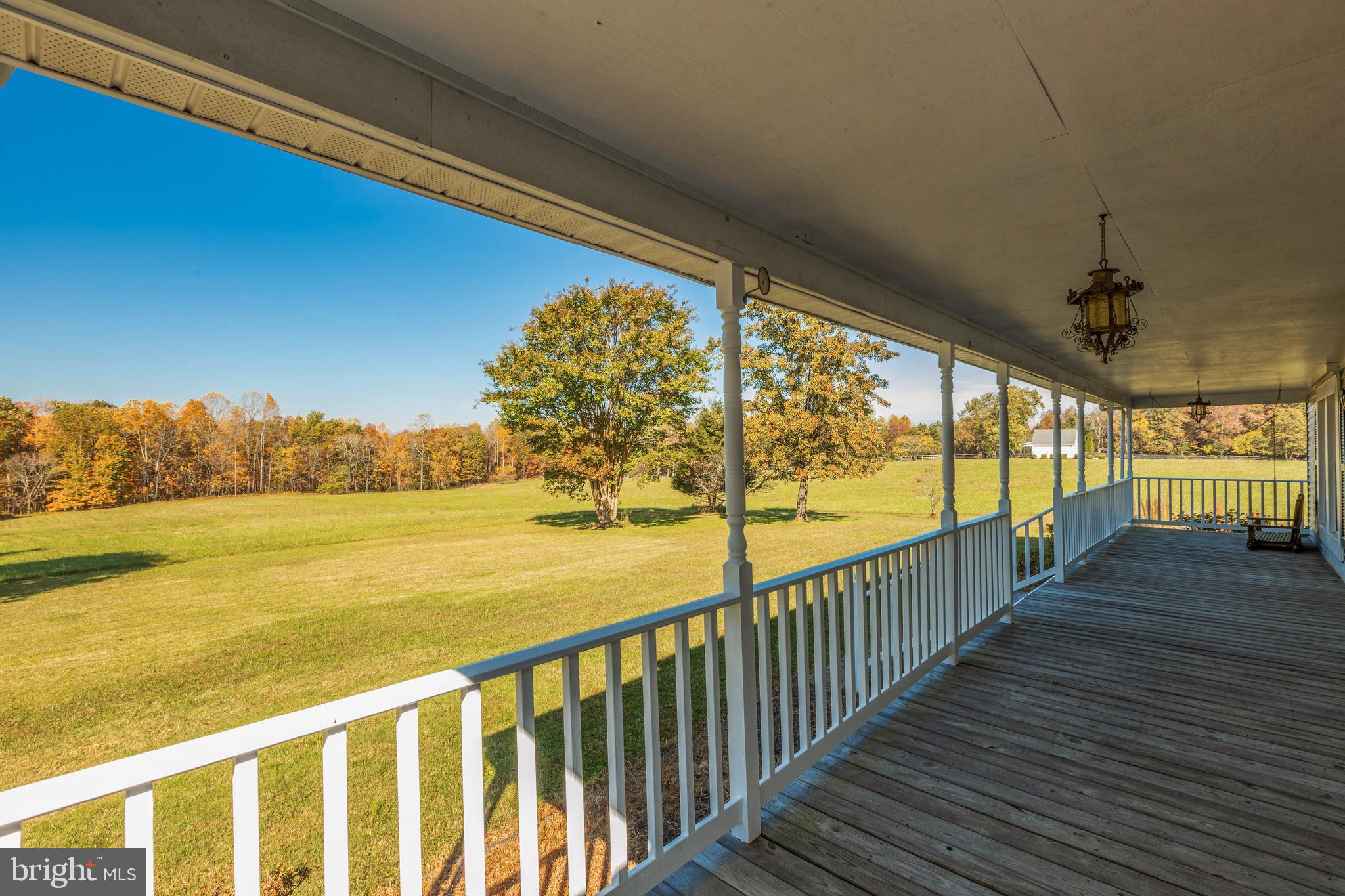 8451 Settle School Road Rixeyville, VA 22737 - Photo 3 of 39 Covered front porch with porch swing