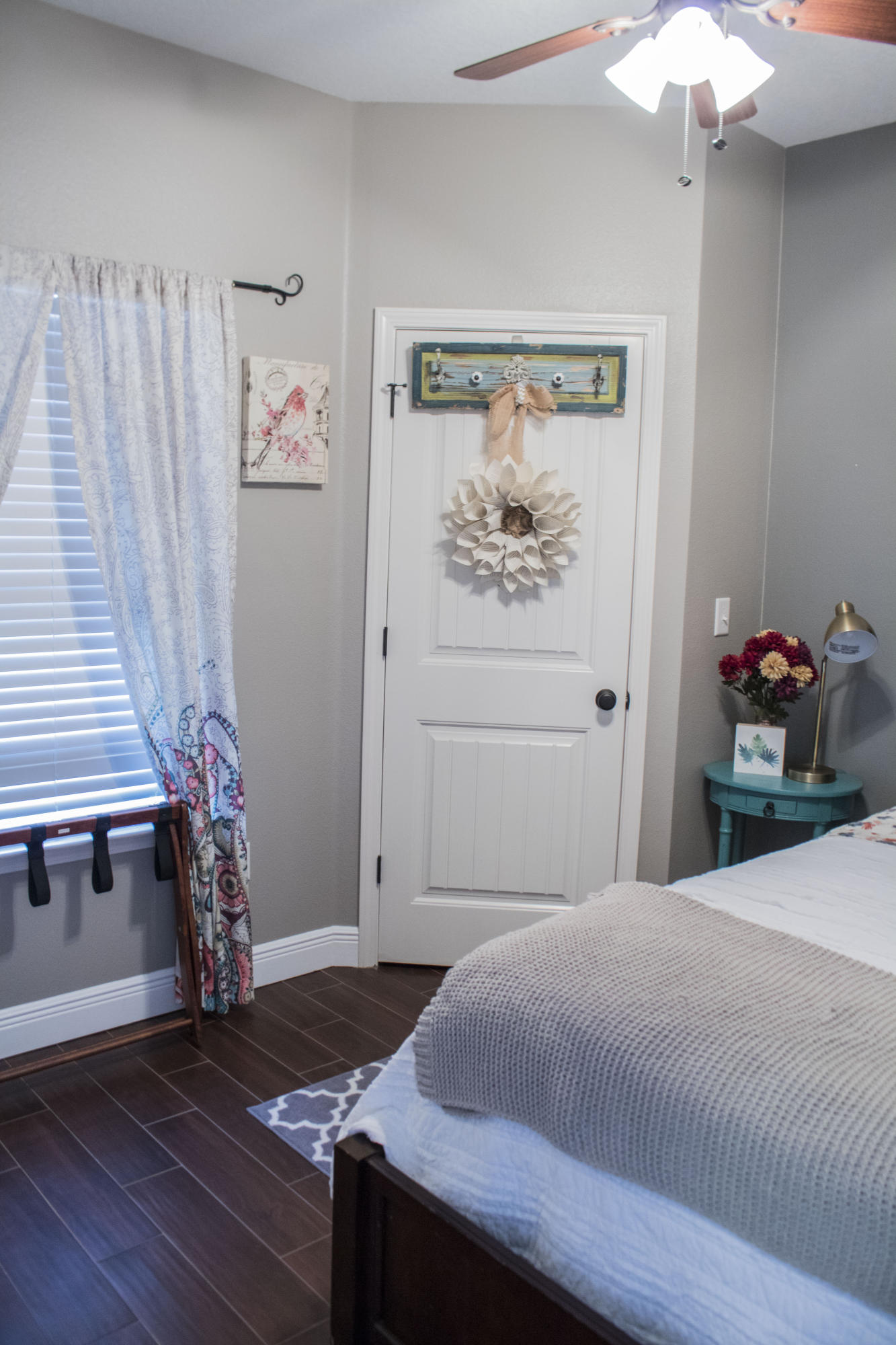 4645 Hermosa Road Crestview, FL 32539 - Photo 22 of 35 a bedroom with a bed and a chandelier