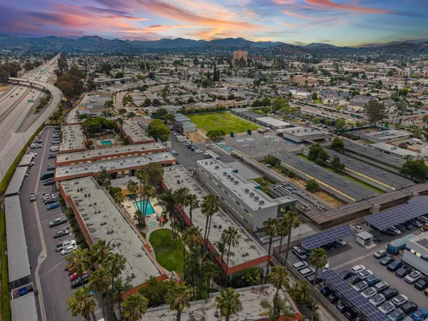 an aerial view of a city with lots of residential buildings