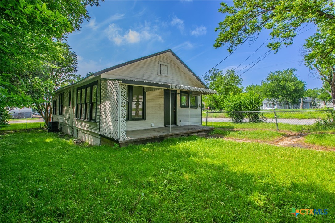 1303 South 15th Street Temple, TX 76504 - Photo 18 of 19 a view of a house with a yard