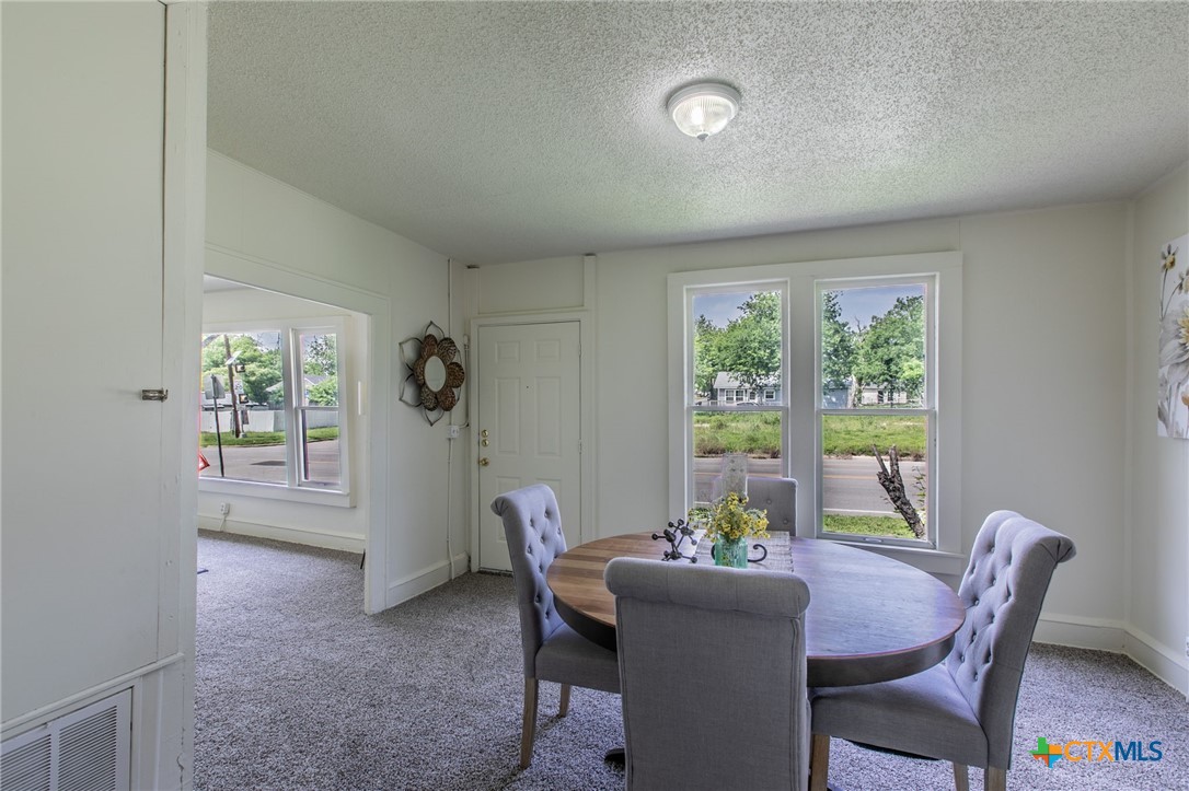 1303 South 15th Street Temple, TX 76504 - Photo 7 of 19 a view of a dining room with furniture window and outside view