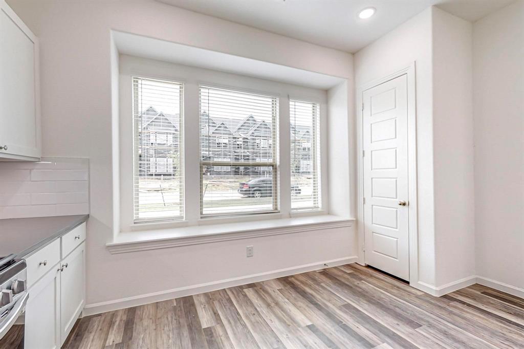 376 Buck Ridge Drive Frisco, TX 75068 - Photo 15 of 40 an empty room with windows