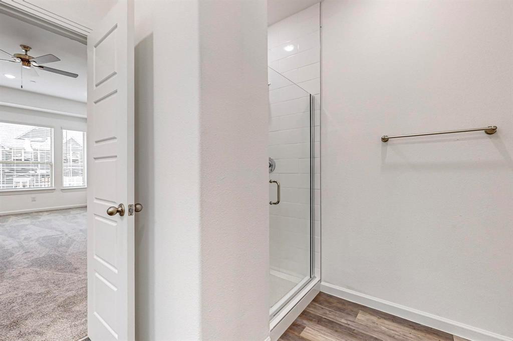376 Buck Ridge Drive Frisco, TX 75068 - Photo 25 of 40 a bathroom with a shower