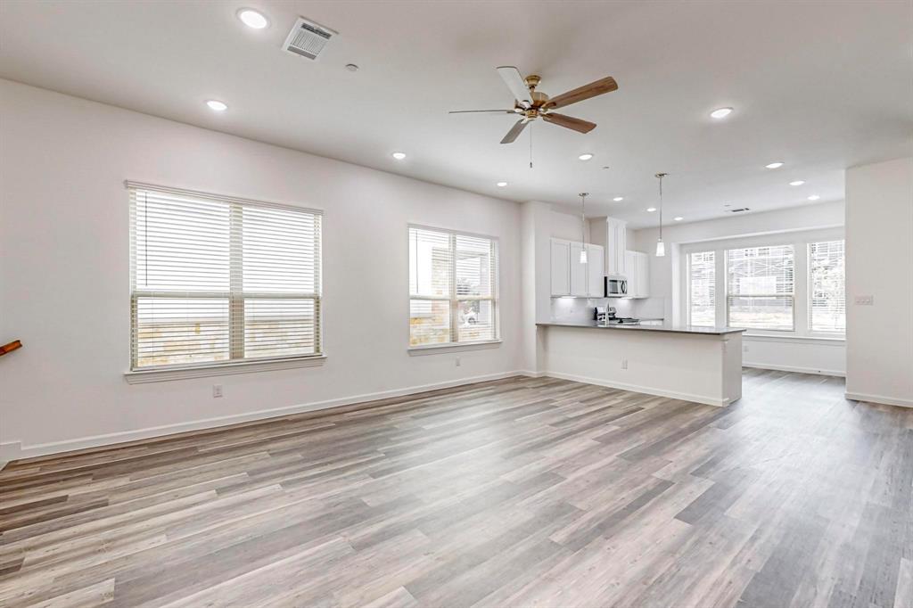 376 Buck Ridge Drive Frisco, TX 75068 - Photo 9 of 40 a view of an empty room with a window