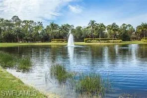 a view of a lake view with a large trees