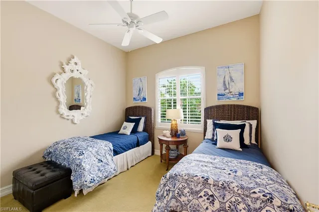 a bedroom with furniture and a window